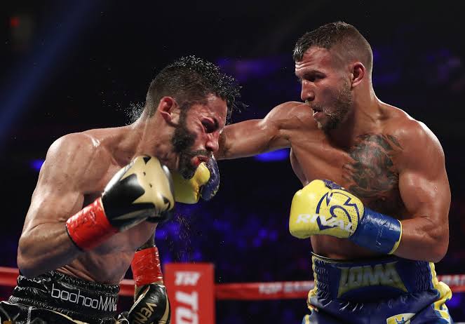 Lomachenko landing a right hand against Jorge Linares