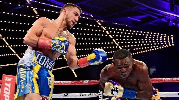 Lomachenko attacking Guillermo Rigondeaux in the ring